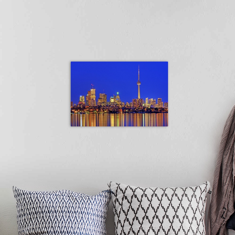 A bohemian room featuring Toronto Skyline at dusk.