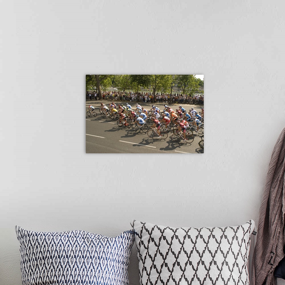 A bohemian room featuring Thousands line the Quai des Tuileries to welcome the peloton in the Tour de France at the finish ...