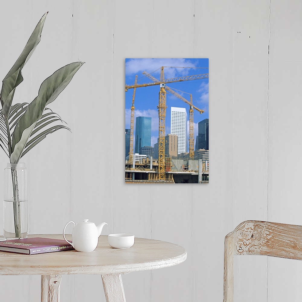 A farmhouse room featuring Tower cranes, commercial construction site