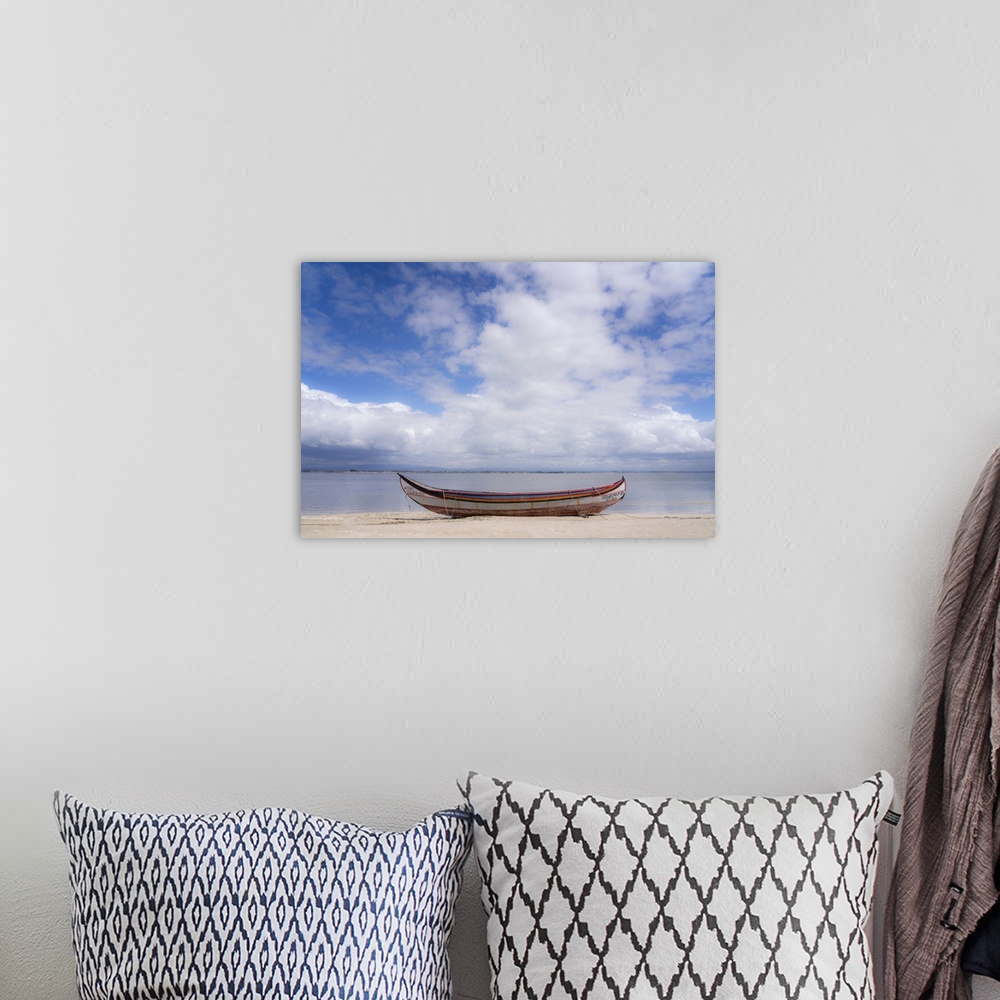 A bohemian room featuring Europe, Portugal, Torreira. Traditional fishing boat on beach.