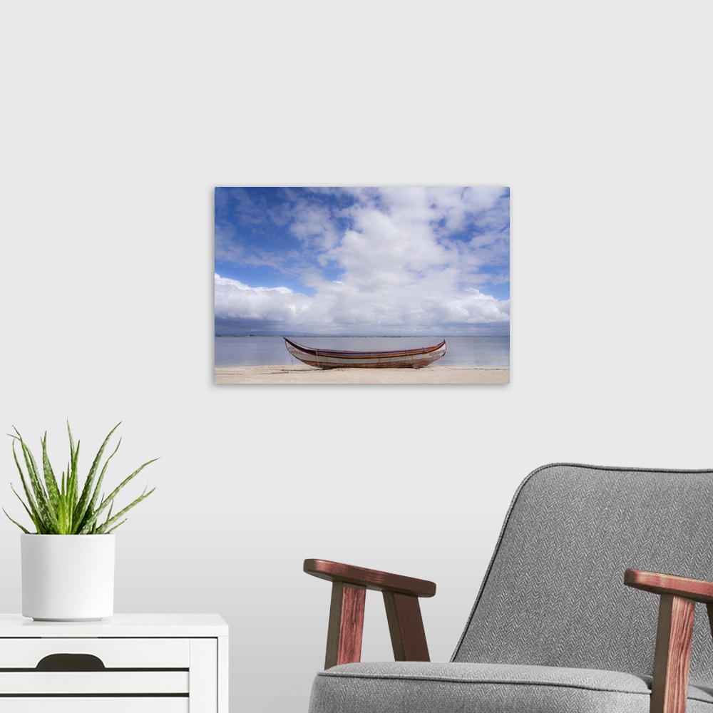 A modern room featuring Europe, Portugal, Torreira. Traditional fishing boat on beach.