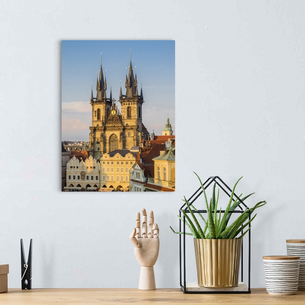 A bohemian room featuring Europe, Czech Republic, Prague.  Tyn Church, founded in 1385, dominates one side of the Old Town ...
