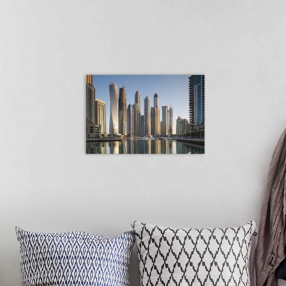 A bohemian room featuring UAE, Dubai, Dubai Marina, high rise buildings including the twisted Cayan Tower, morning