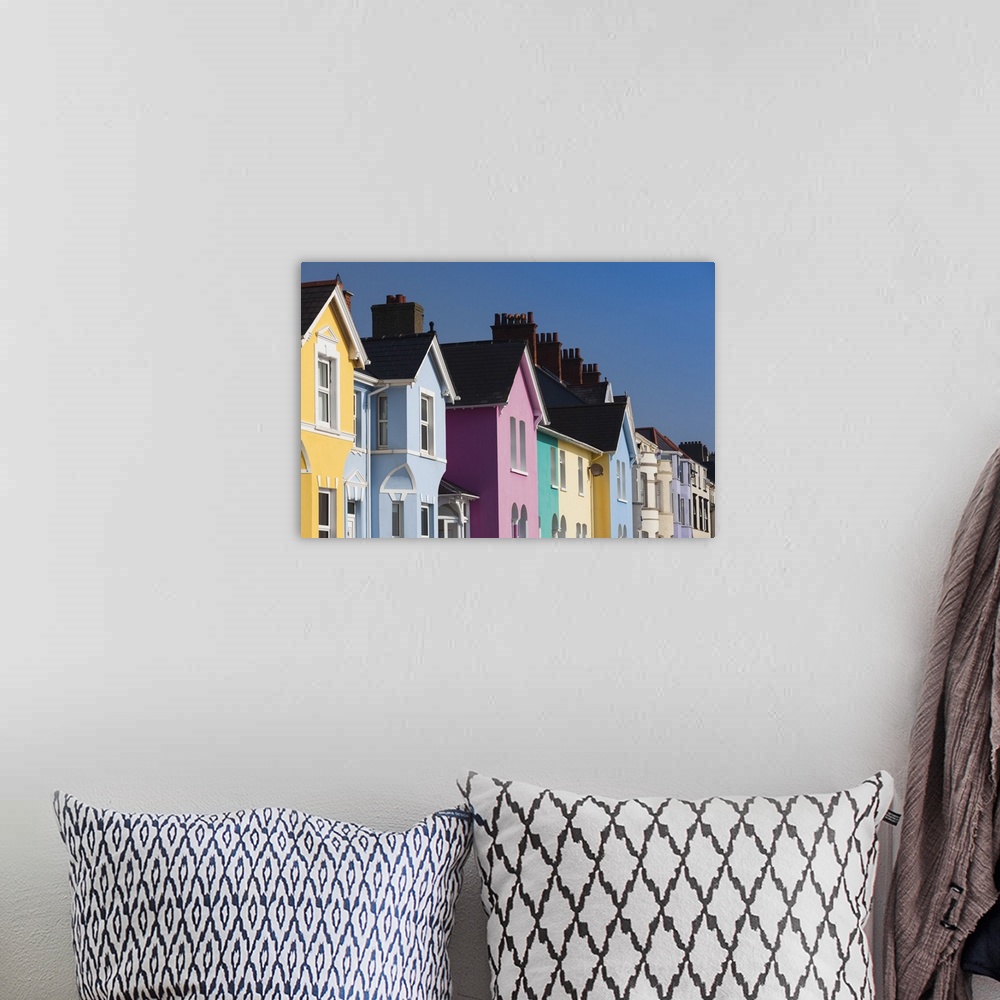 A bohemian room featuring UK, Northern Ireland, County Antrim, Whitehead, colorful houses.