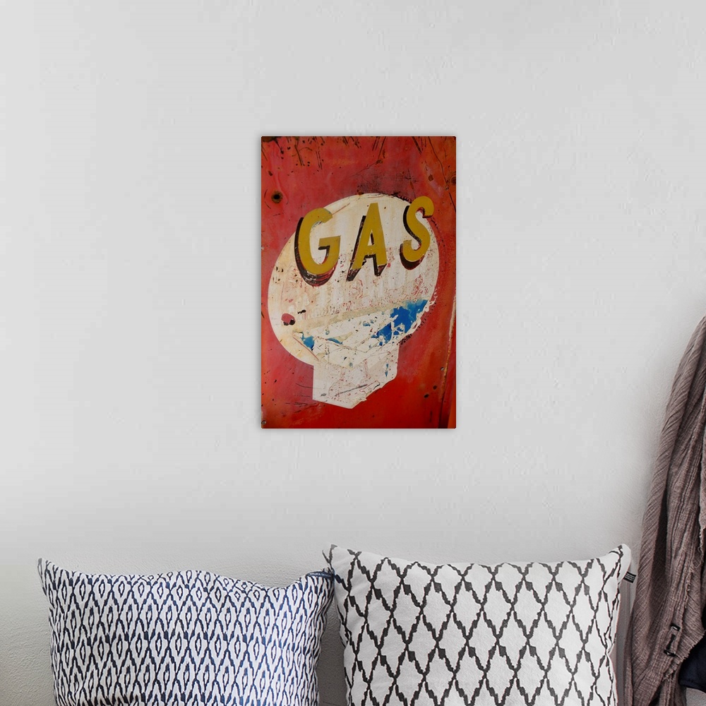 A bohemian room featuring USA, Arizona, Jerome, Brightly painted antique gas sign, Gold King Mine.