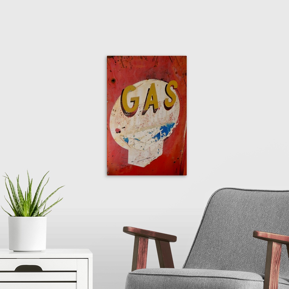 A modern room featuring USA, Arizona, Jerome, Brightly painted antique gas sign, Gold King Mine.