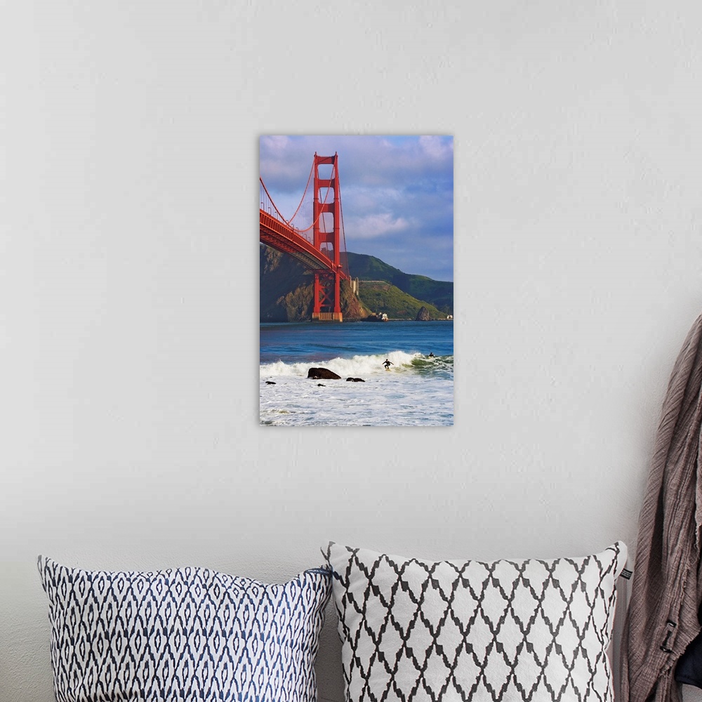 A bohemian room featuring USA, California, San Francisco. Surfers below the Golden Gate Bridge.