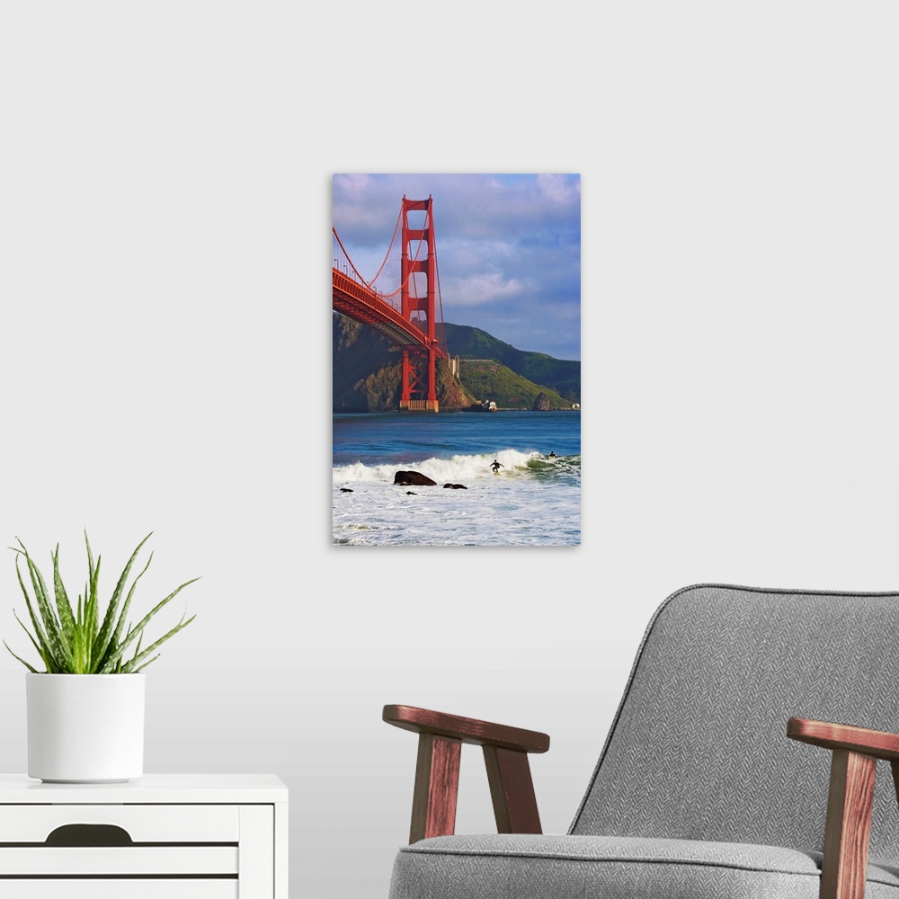 A modern room featuring USA, California, San Francisco. Surfers below the Golden Gate Bridge.