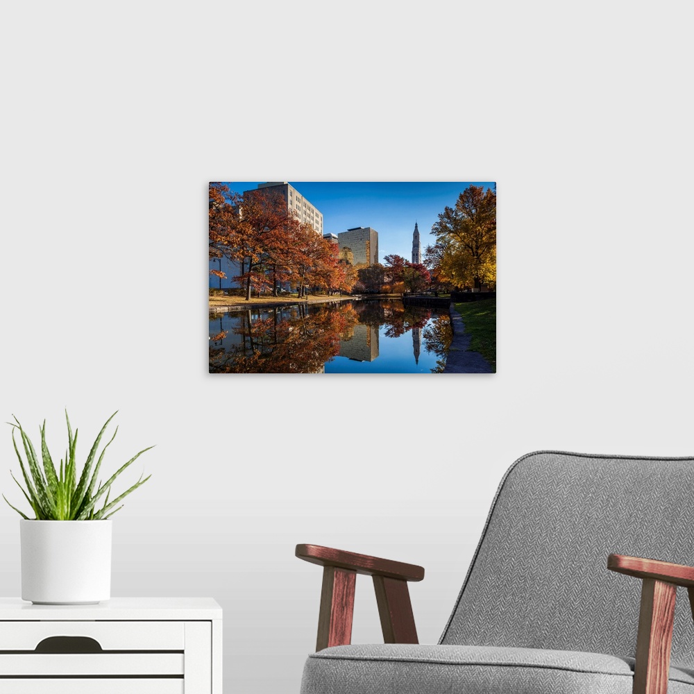 A modern room featuring USA, Connecticut, Hartford, Bushnell Park, reflection of office buildings and Travelers Tower, He...