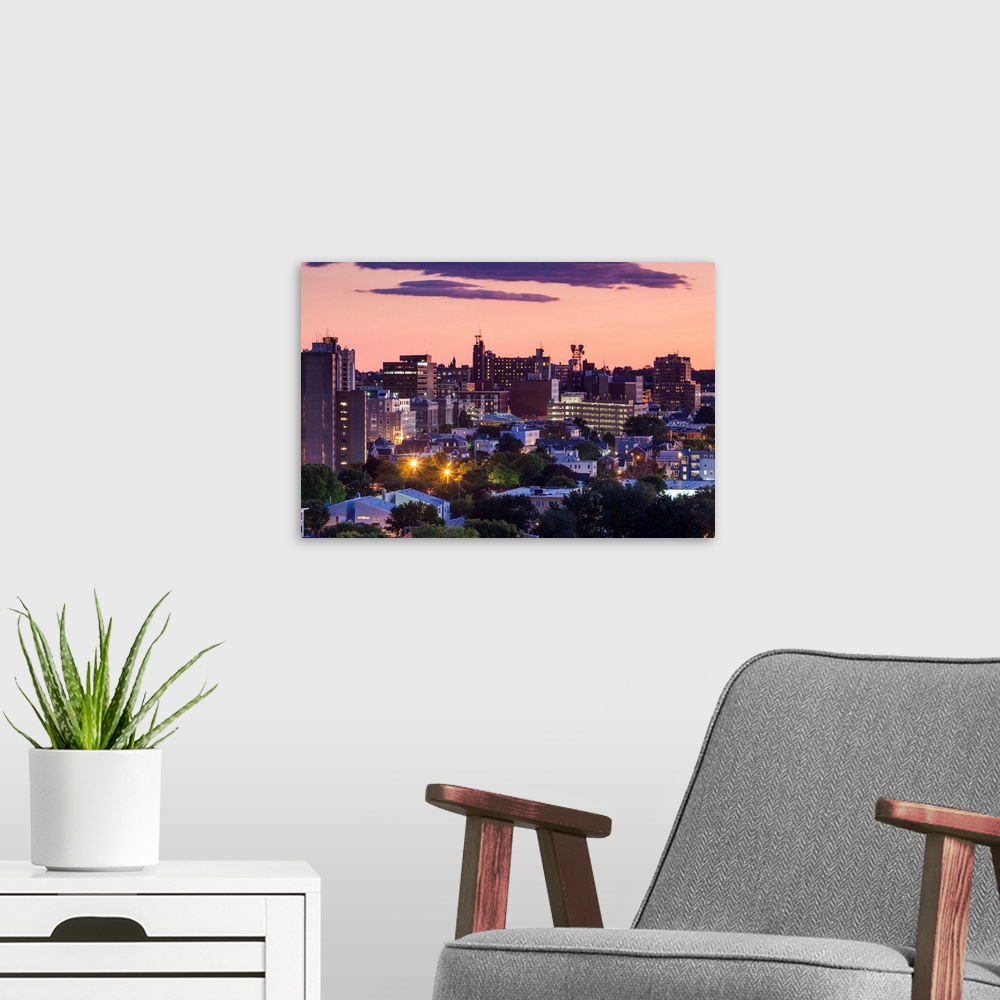 A modern room featuring USA, Maine, Portland, skyline from Munjoy Hill at dusk