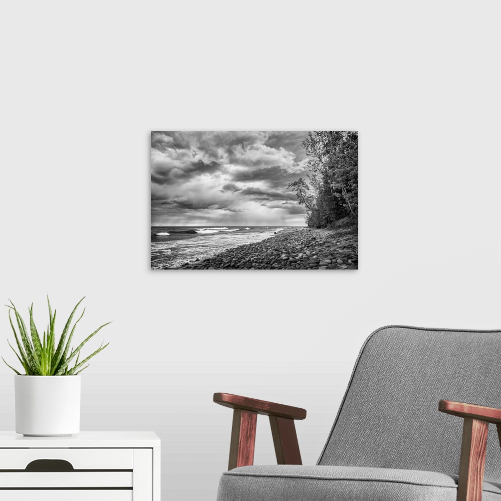 A modern room featuring USA, Michigan, Munising. Receding storm clouds at Pictured Rocks National Lakeshore. United State...