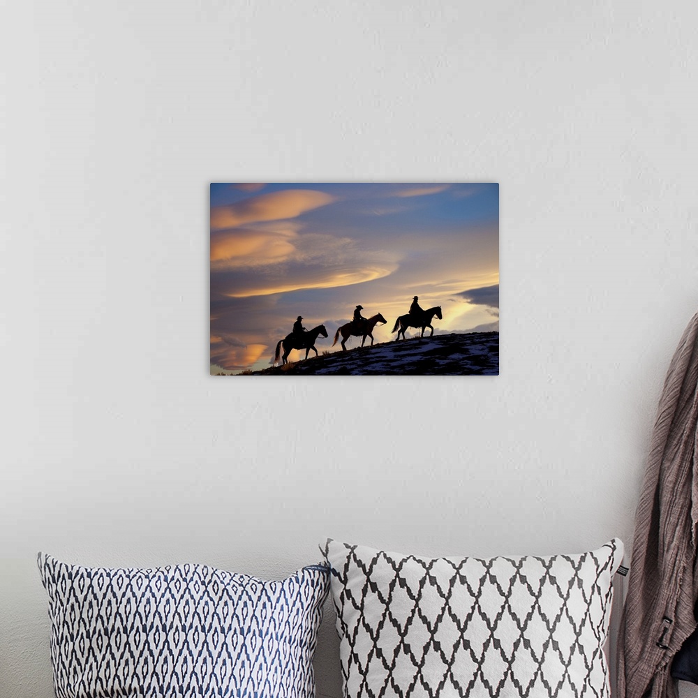 A bohemian room featuring USA, Shell, Wyoming, Hideout Ranch, Cowboys And Cowgirls Silhouetted, Sunset