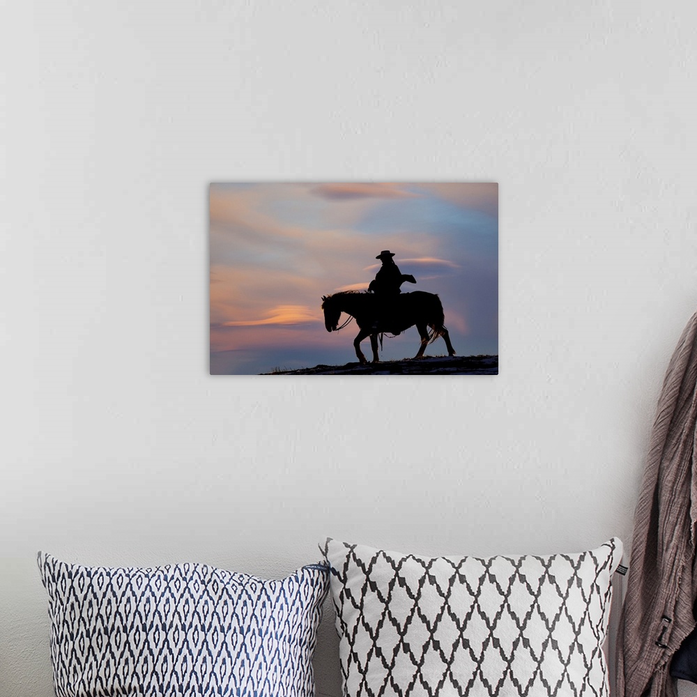 A bohemian room featuring USA, Shell, Wyoming, Hideout Ranch Cowgirl Silhouetted On Horseback At Sunset