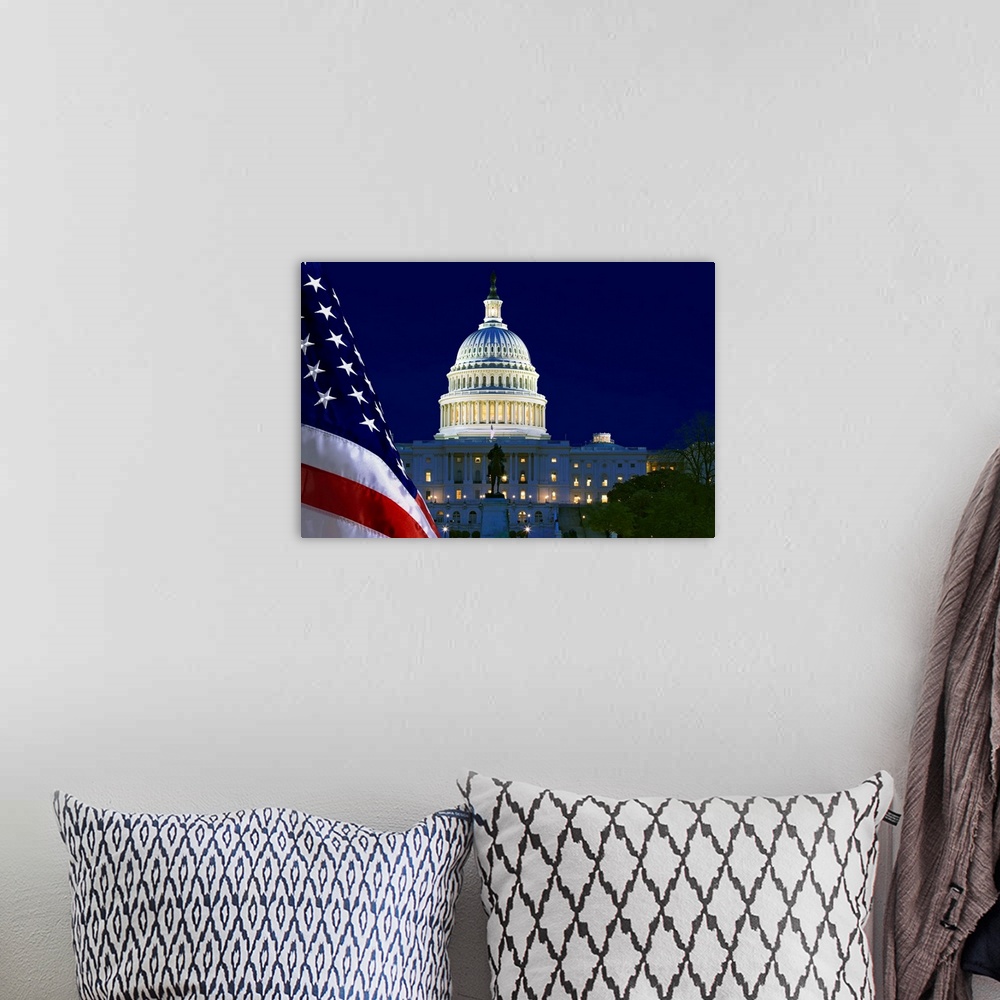 A bohemian room featuring USA, Washington, DC. Capitol Building and US flag at night.