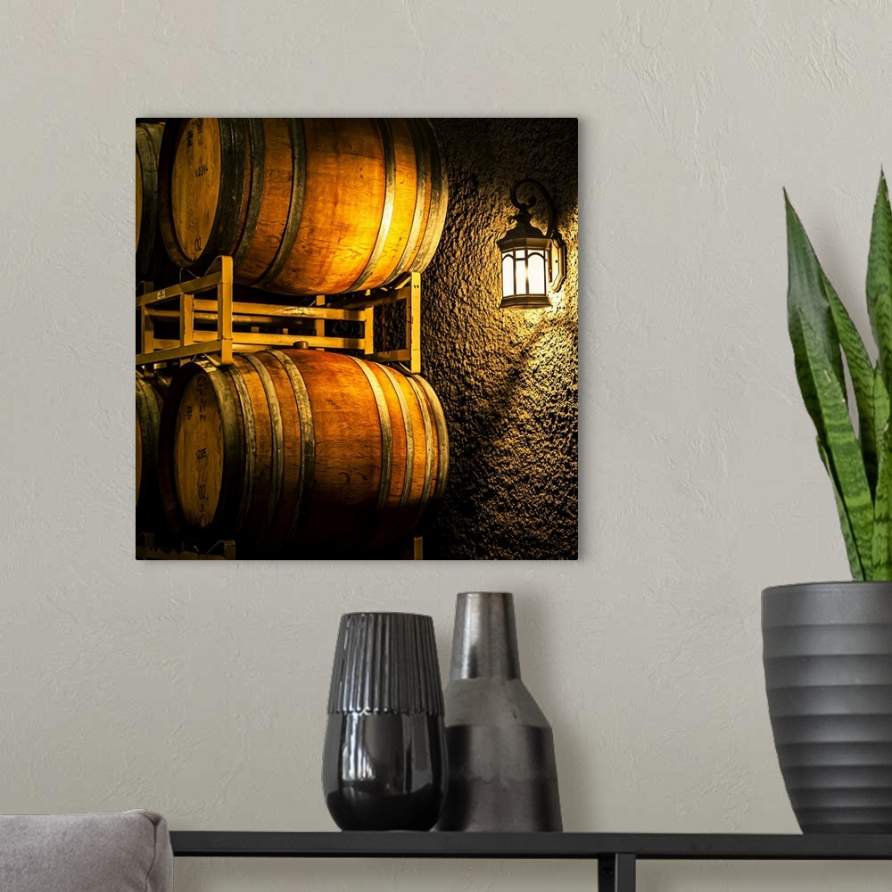A modern room featuring USA, Washington state, Yakima valley. Barrel cave in low light.