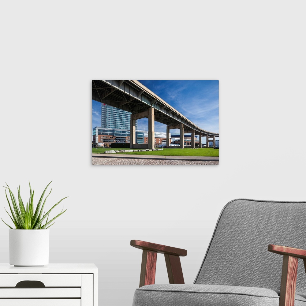 A modern room featuring USA, Western New York, Buffalo, Canalside Park, renovated former industrial zone, Route 5 overpass.