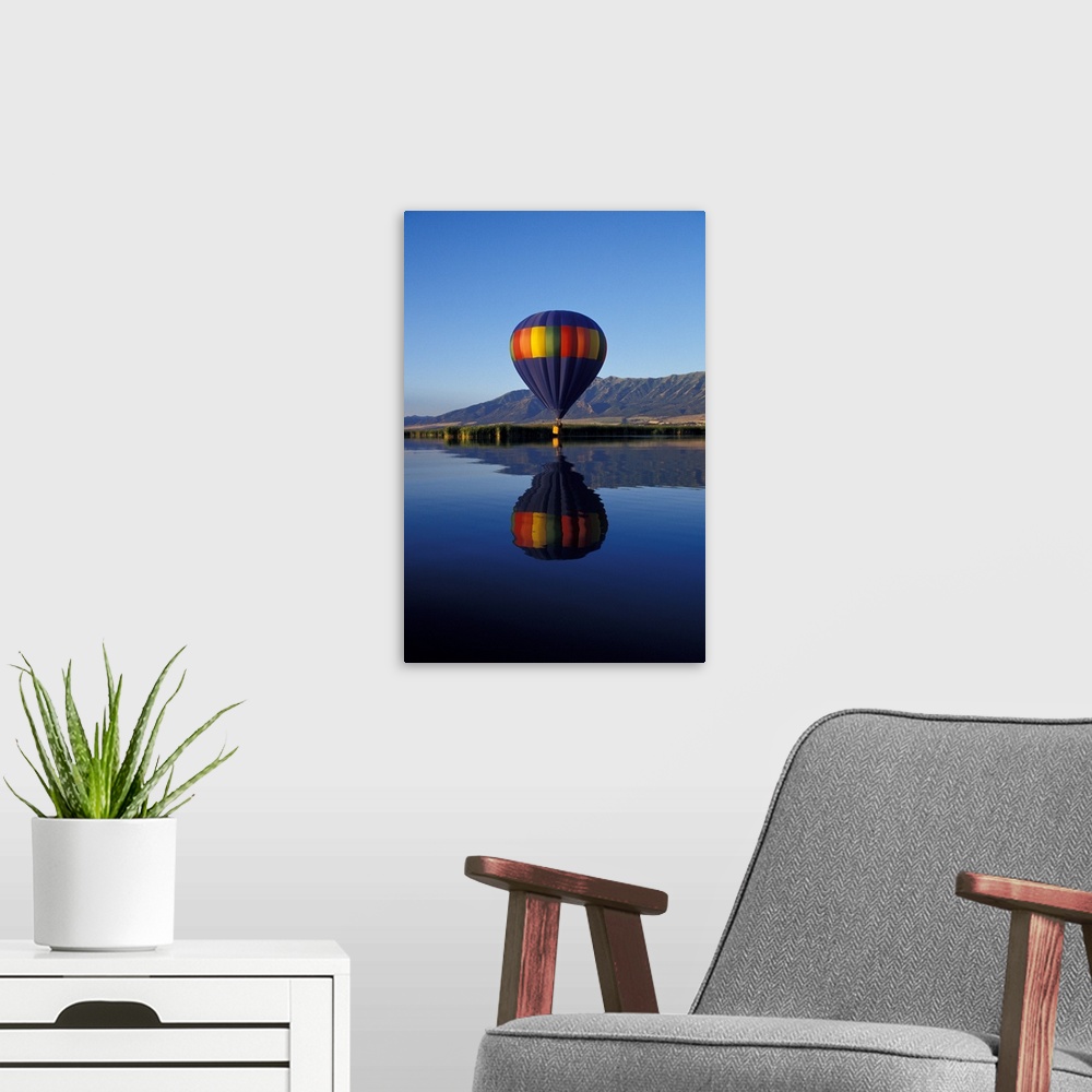 A modern room featuring Utah, Cache Valley, Hot air balloon on Logan River Marshes at sunrise.
