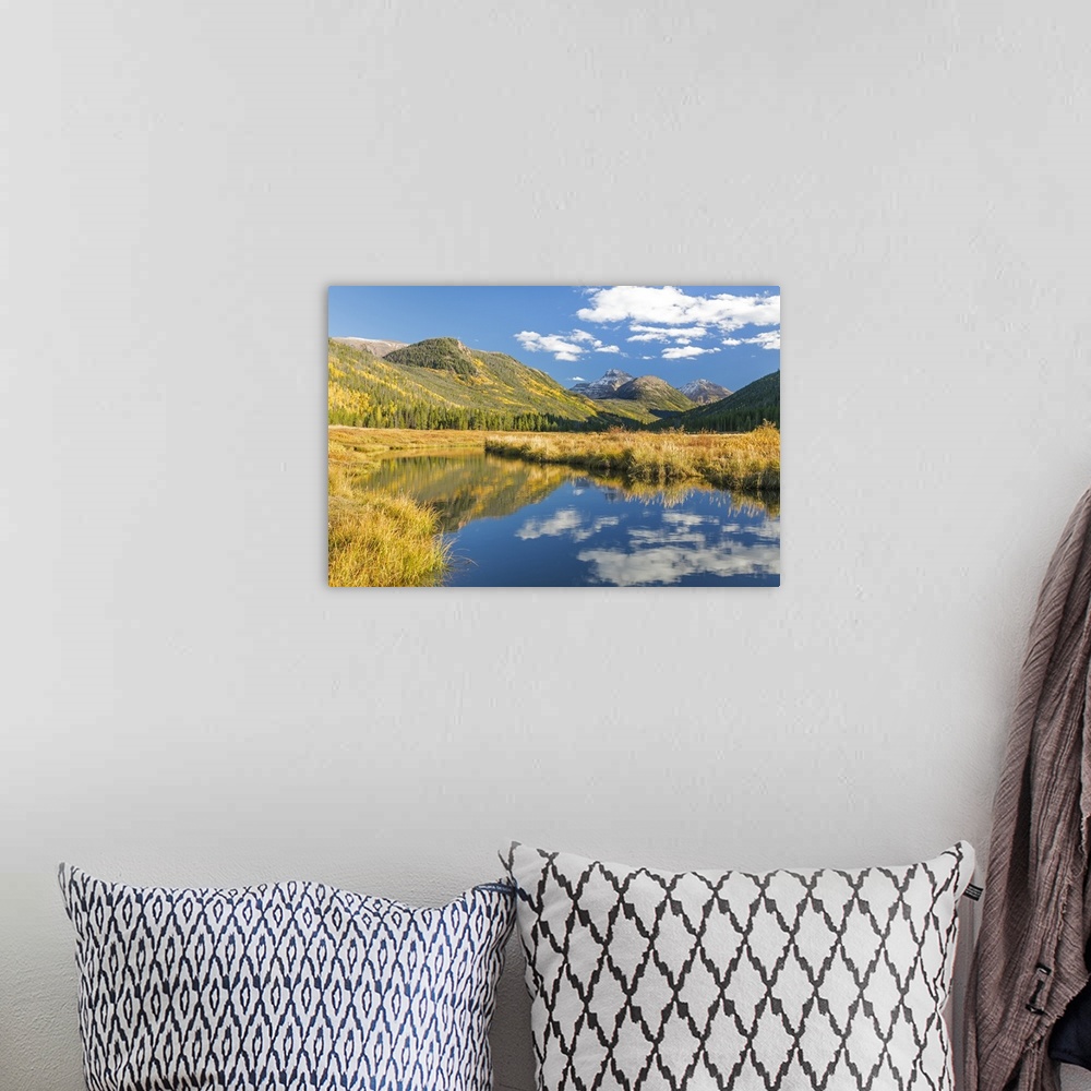 A bohemian room featuring USA, Utah, Wasatch Cache National Forest. Mountain and river landscape.