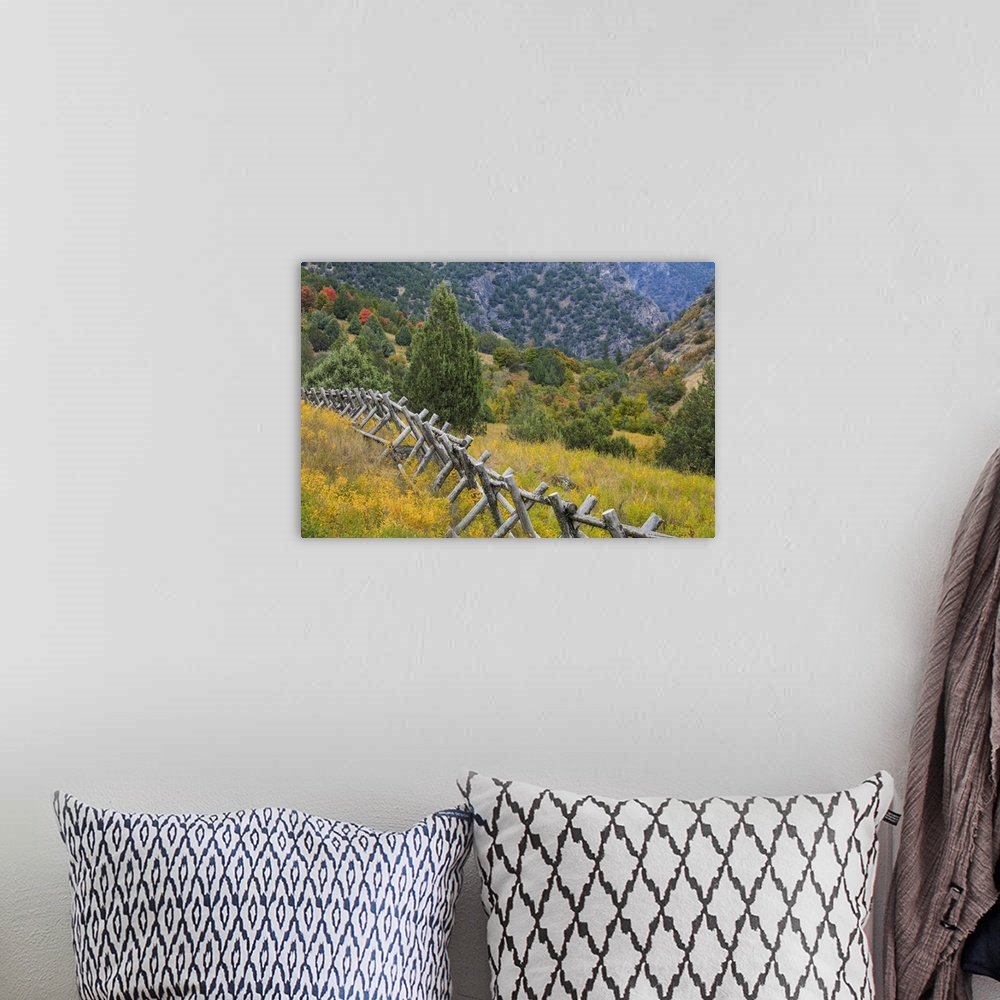 A bohemian room featuring USA, Utah, Wasatch Mountains. Fence and meadow  landscape.