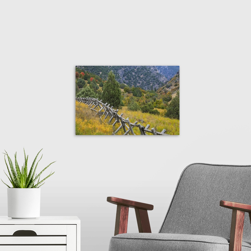 A modern room featuring USA, Utah, Wasatch Mountains. Fence and meadow  landscape.