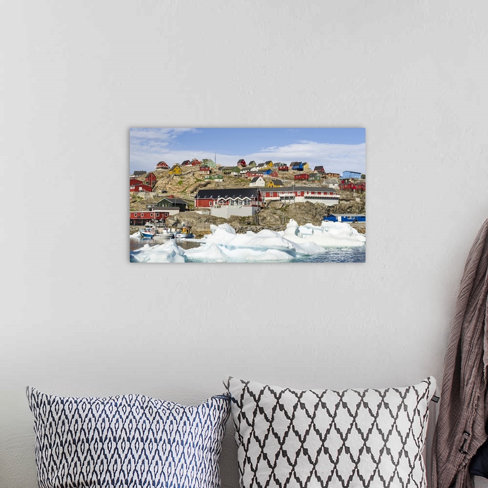 A bohemian room featuring Uummannaq harbor and town, northwest of Greenland, located on an island in the Uummannaq Fjord Sy...