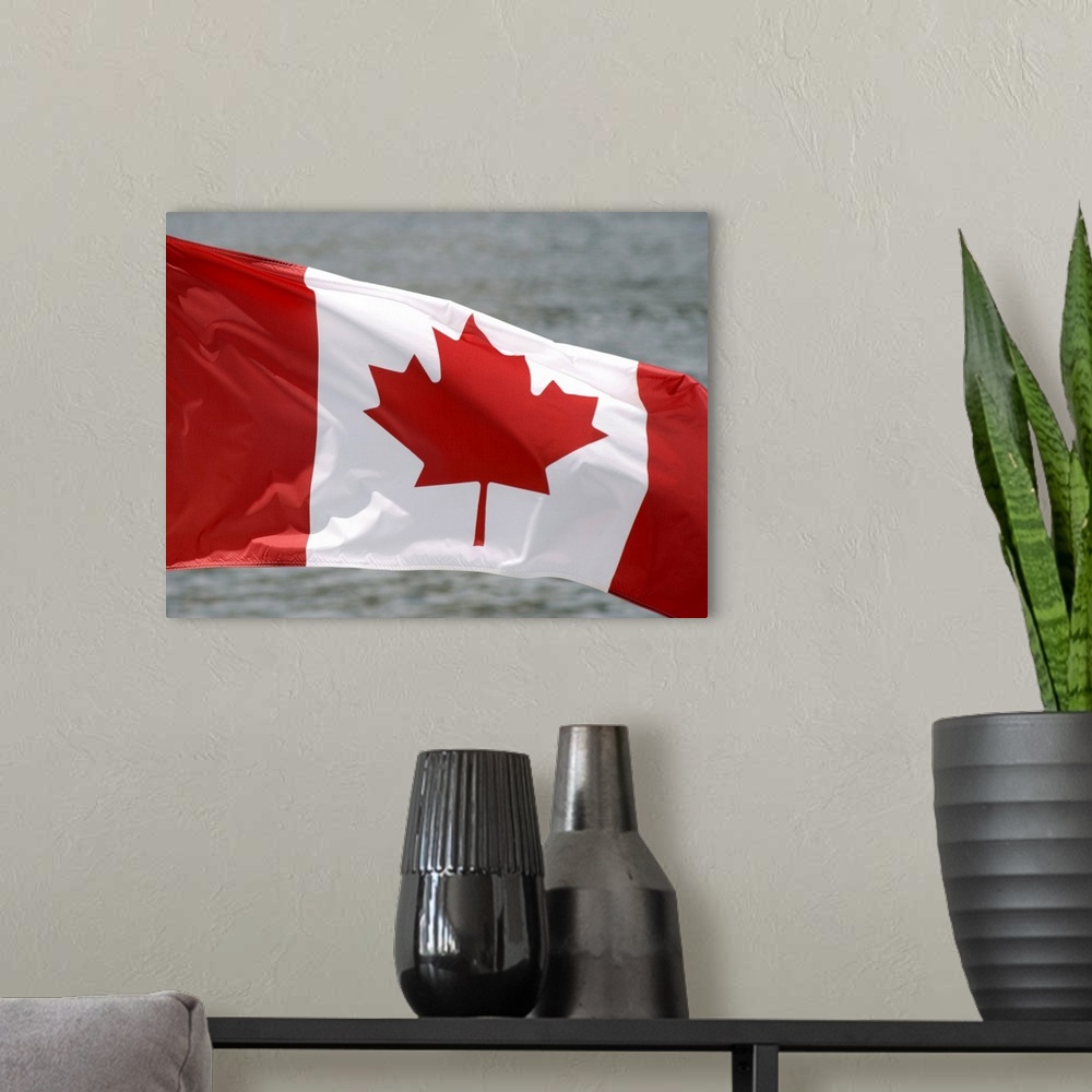 A modern room featuring Victoria, Canada. Canadian flag flying