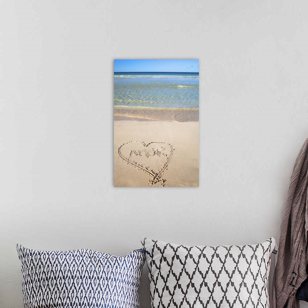 A bohemian room featuring Vieques, Puerto Rico - A heart is drawn in the sand of a beach with the word 'amor' inside. Verti...