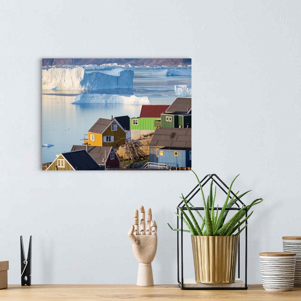 A bohemian room featuring View of fjord full of icebergs towards Nuussuaq peninsula during midnight sun.