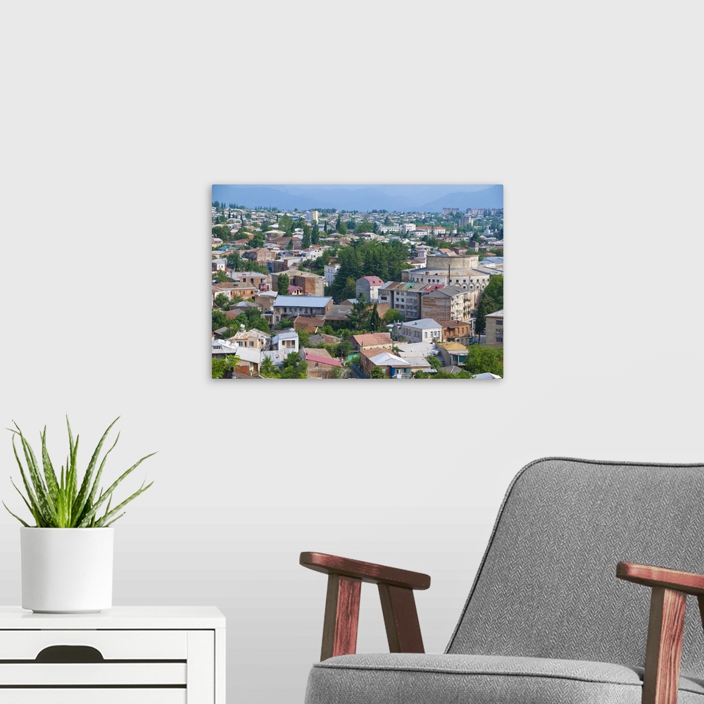 A modern room featuring View of Kutaisi, second largest city in Georgia, Caucasus.