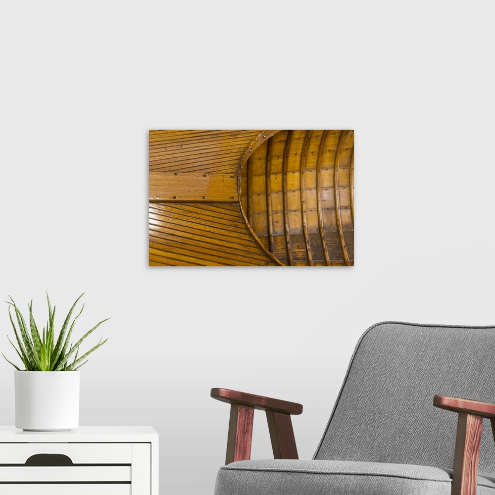 A modern room featuring Vintage wooden canoe detail.