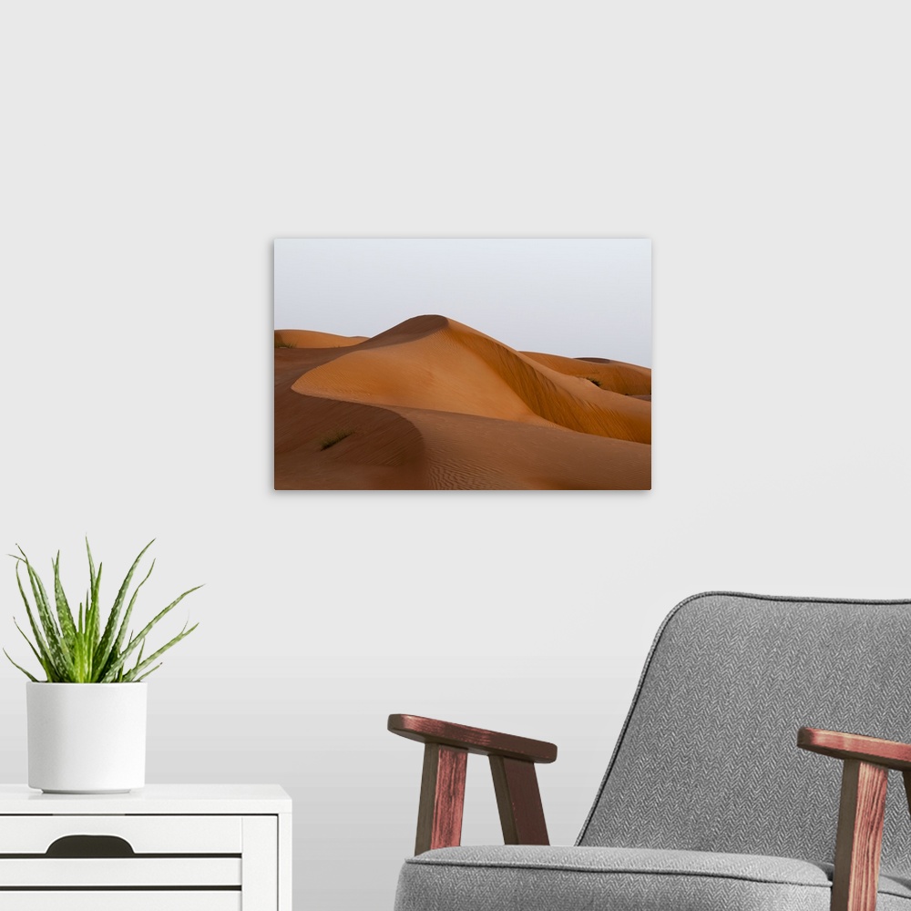 A modern room featuring Wahiba Sands desert, Oman.