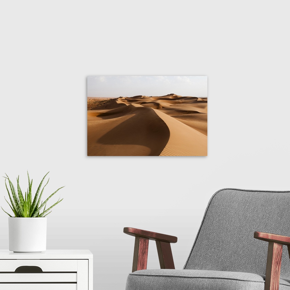 A modern room featuring Wahiba Sands desert, Oman.