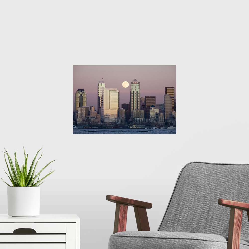 A modern room featuring Washington, Seattle skyline and Elliott Bay with full moon rising, view from Alki.