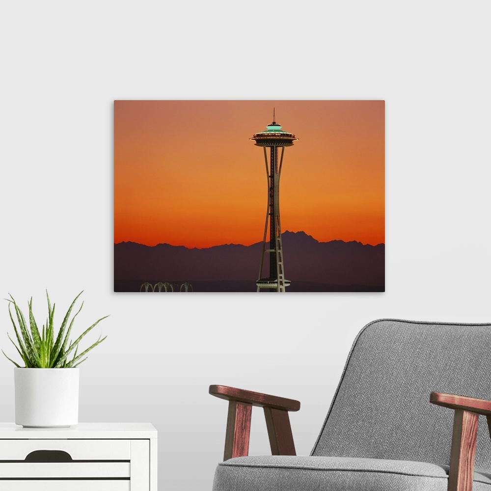 A modern room featuring Washington, Seattle, Space needle and Olympic Mountains at dusk