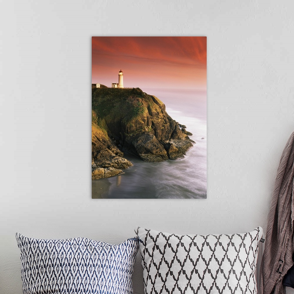 A bohemian room featuring USA, Washington State, Fort Canby State Park, View of North Head Lighthouse on cliff.