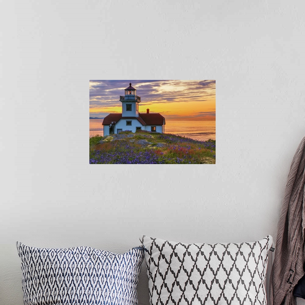 A bohemian room featuring USA, Washington, San Juan Islands. Patos Lighthouse and camas flowers at sunset.