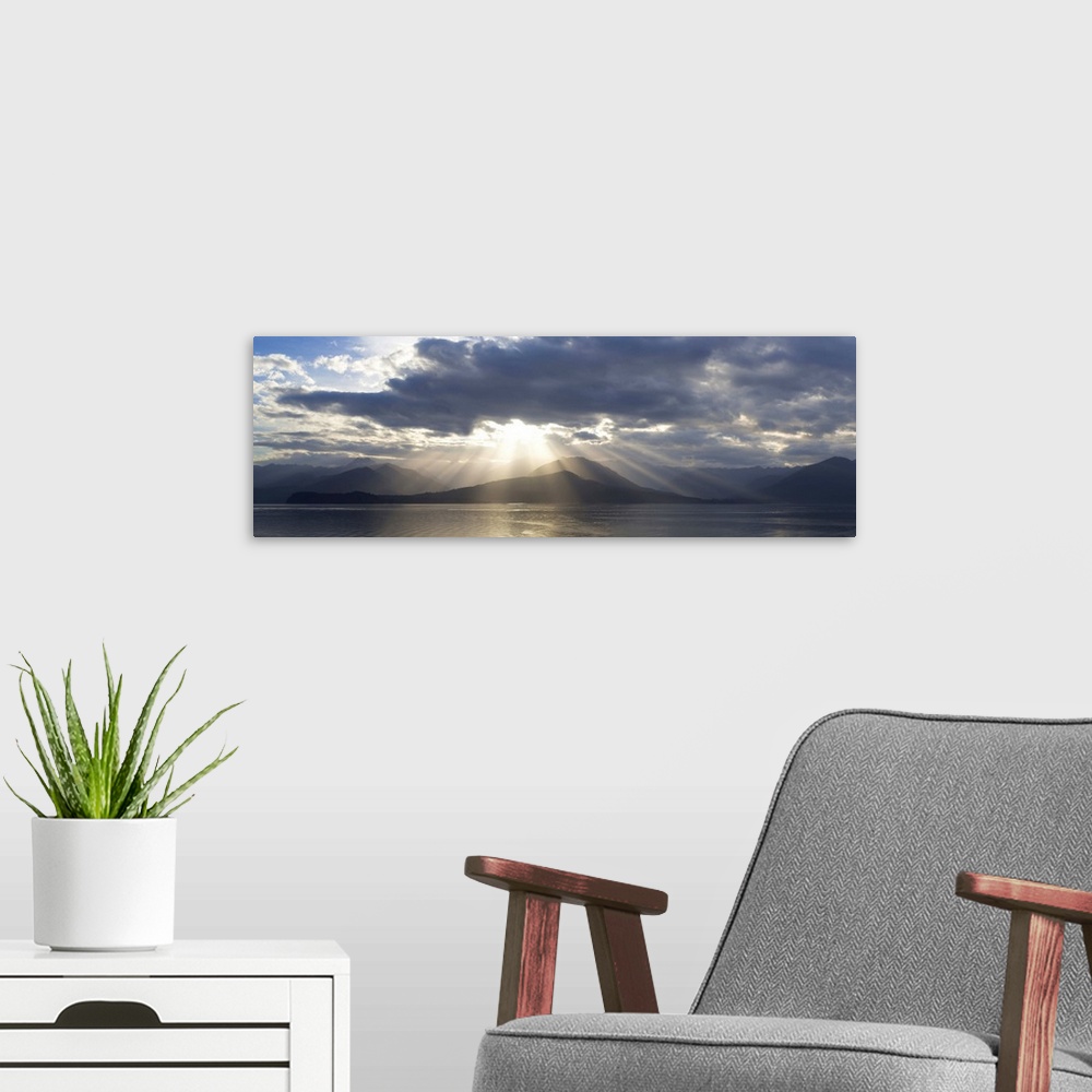 A modern room featuring USA, Washington, Seabeck. Composite of God rays over Hood Canal.