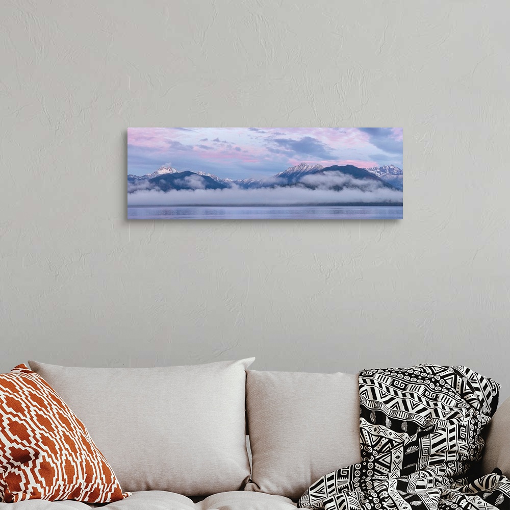 A bohemian room featuring USA, Washington State, Seabeck. Composite of Hood Canal and Olympic Mountains at sunrise. Credit:...
