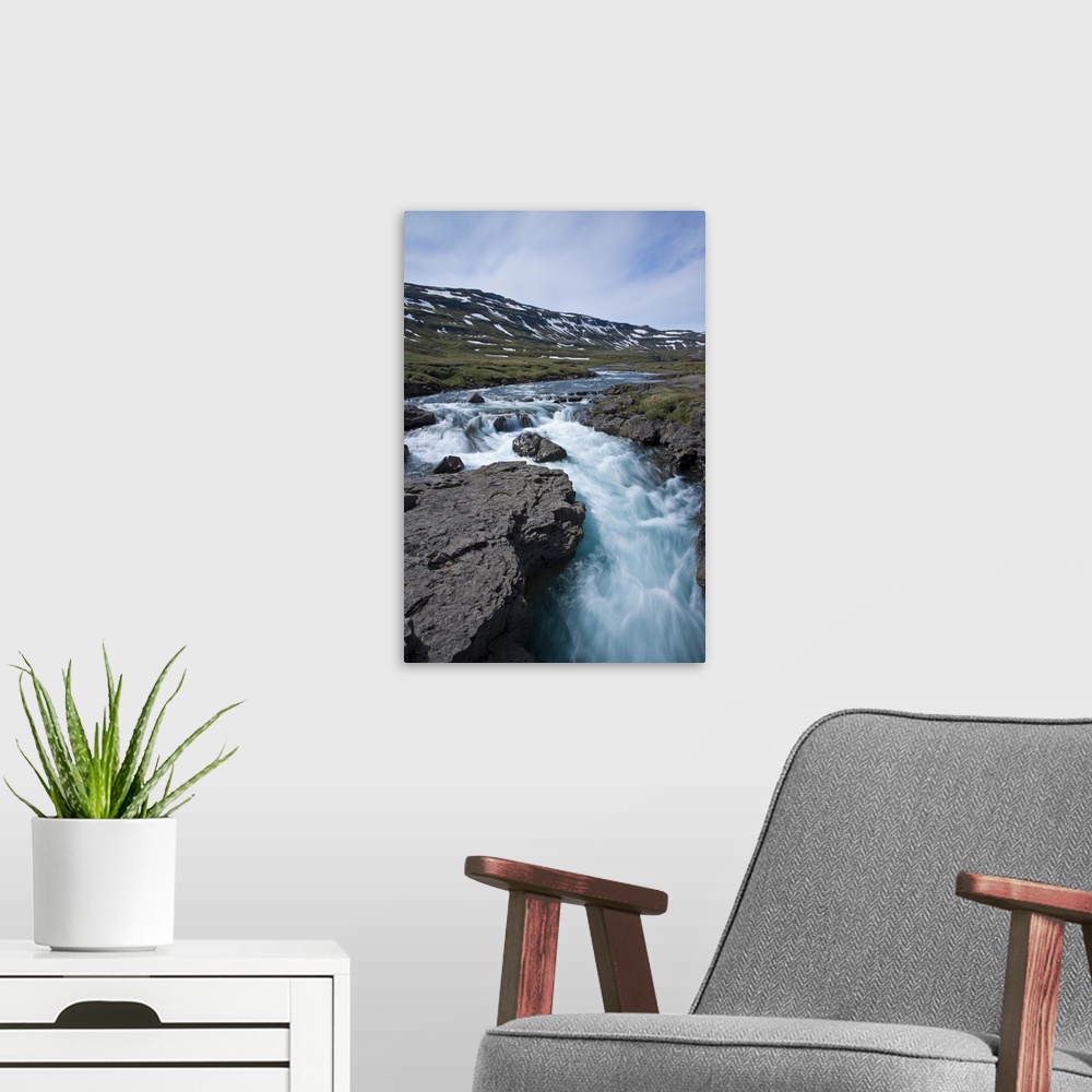 A modern room featuring Waterfall in southeastern Iceland.g