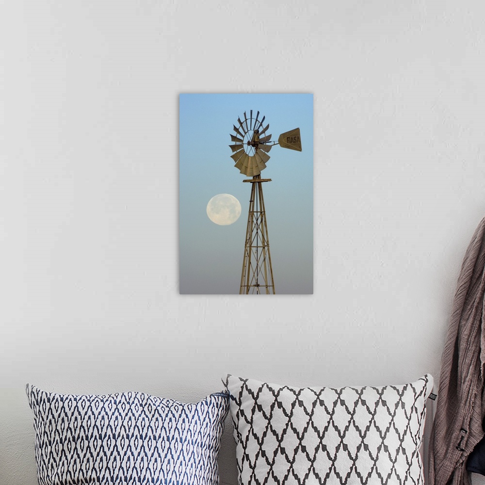 A bohemian room featuring Windmill at sunrise with Full Moon, Canyon, Panhandle, Texas, USA, February 2006