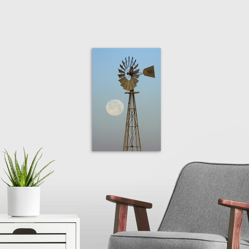 A modern room featuring Windmill at sunrise with Full Moon, Canyon, Panhandle, Texas, USA, February 2006