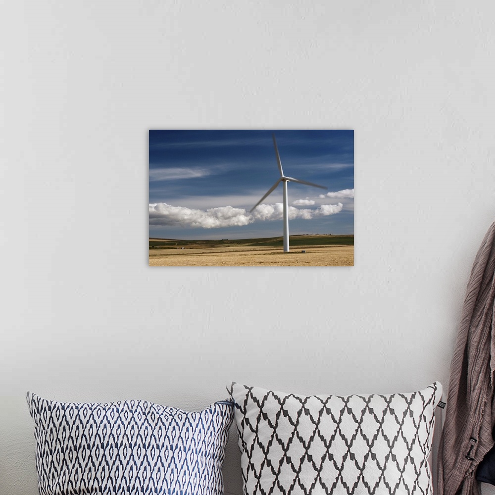 A bohemian room featuring Windmill power generation in Alberta, Canada