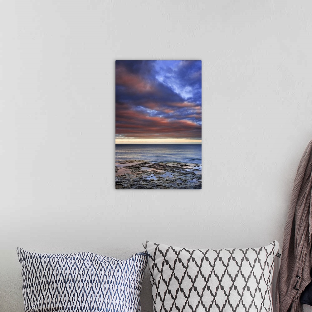 A bohemian room featuring Wisconsin, sunrise on clouds seen from the shore of Lake Michigan.