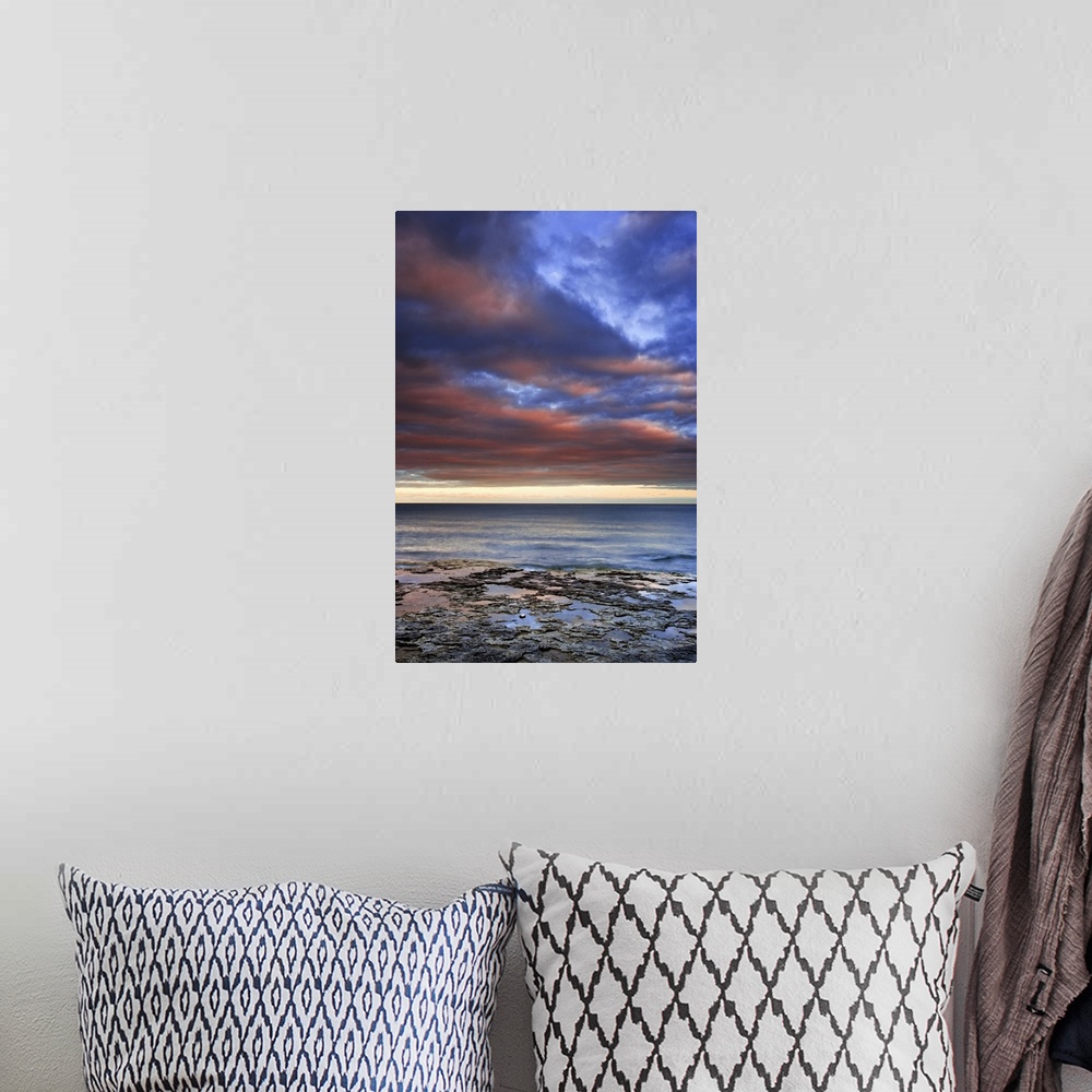 A bohemian room featuring Wisconsin, sunrise on clouds seen from the shore of Lake Michigan.