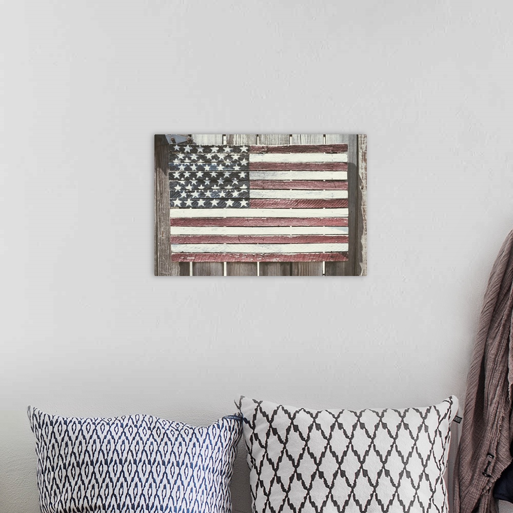 A bohemian room featuring Worn wooden American flag, Fire Island, New York.