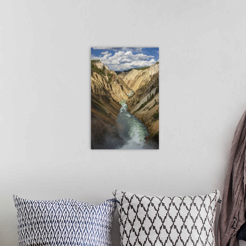 A bohemian room featuring North America, USA, Wyoming, Yellowstone National Park.  Yellowstone River with clouds over the G...