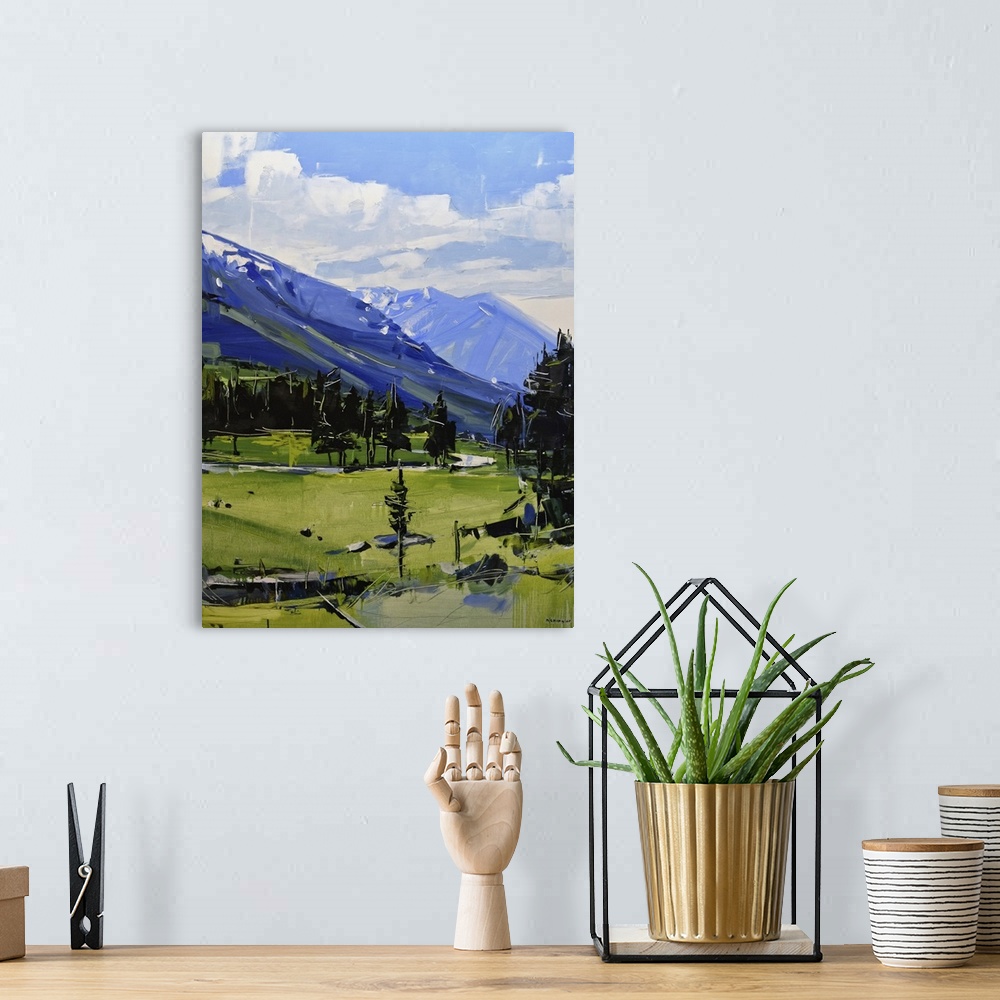 A bohemian room featuring Contemporary palette knife painting of a green valley under a blue sky in the Colorado Rocky Moun...