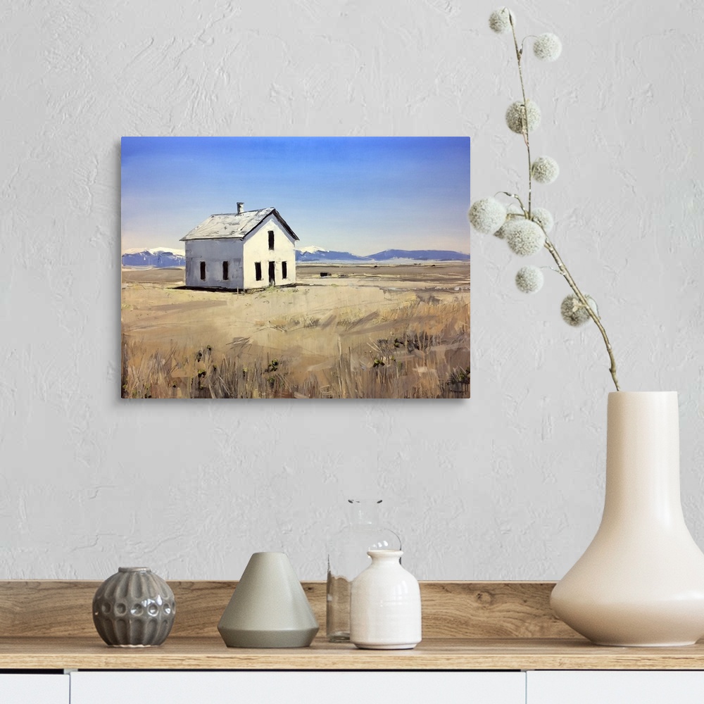 A farmhouse room featuring Contemporary painting of a white house in a field, under a blue sky.