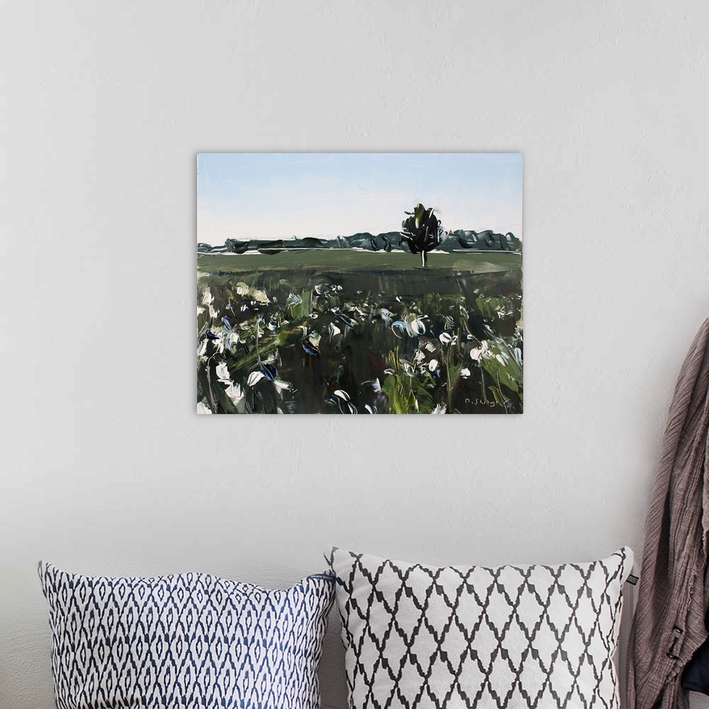 A bohemian room featuring A contemporary painting of a cotton field with a line of trees in the background.