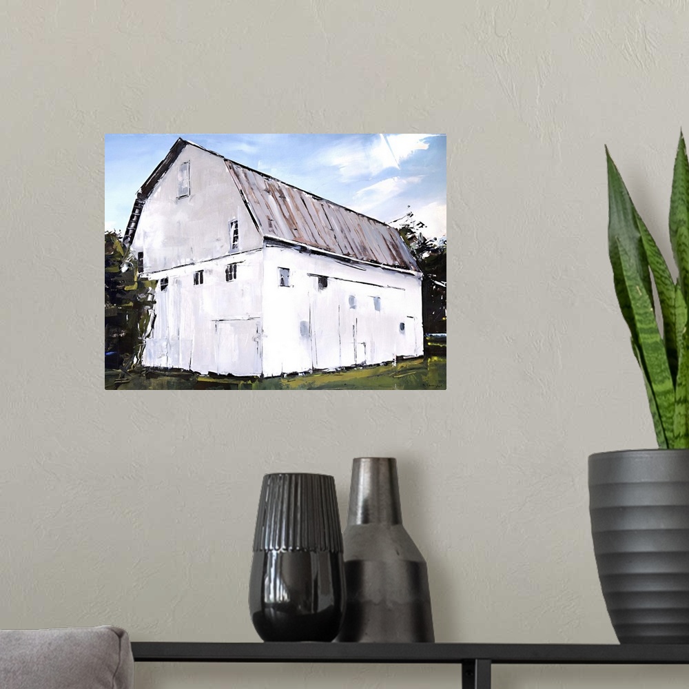 A modern room featuring Contemporary painting of a large white barn surrounded by dark trees, under a blue sky.